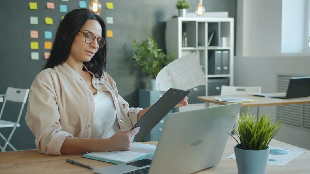 woman reviewing insurance documents